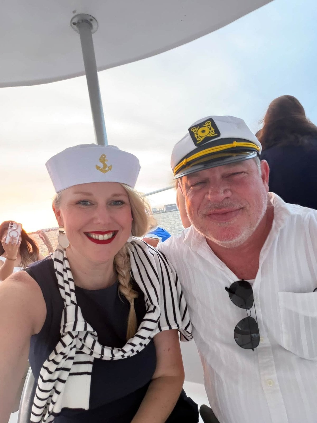 Lia and Scott Moon of Princess Cruises, enjoying the sunset catamaran cruise to Isla Mujeres with the group