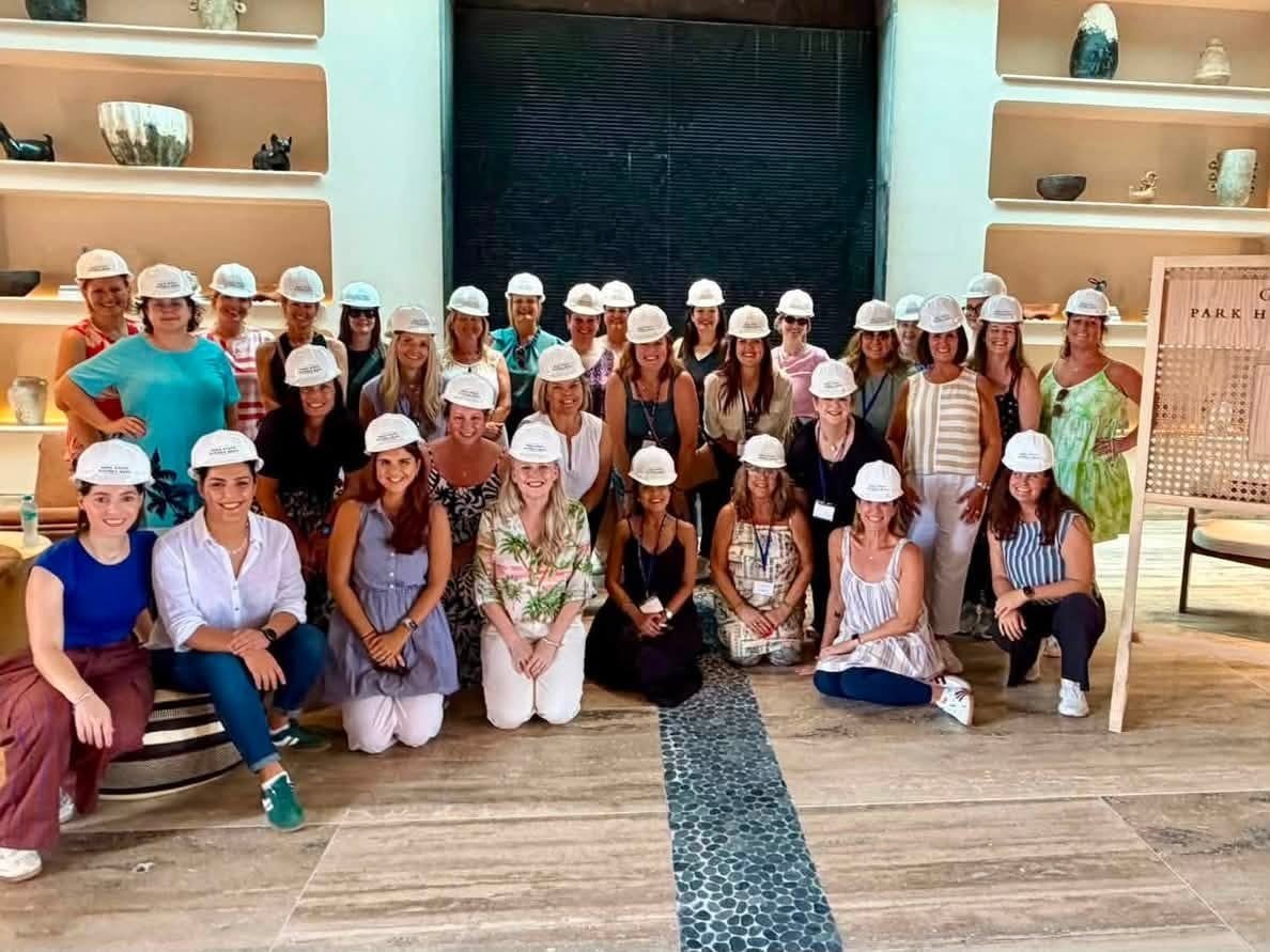 Vincent Vacations advisors in white hardhats touring the construction site of Park Hyatt Riviera Maya