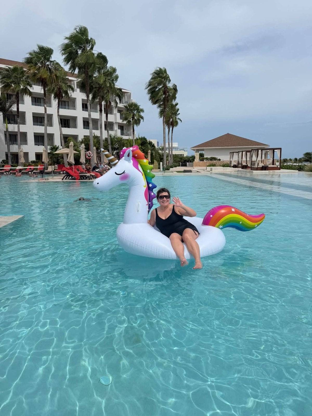Unwinding during the morning pool party before embarking on the catamaran cruise