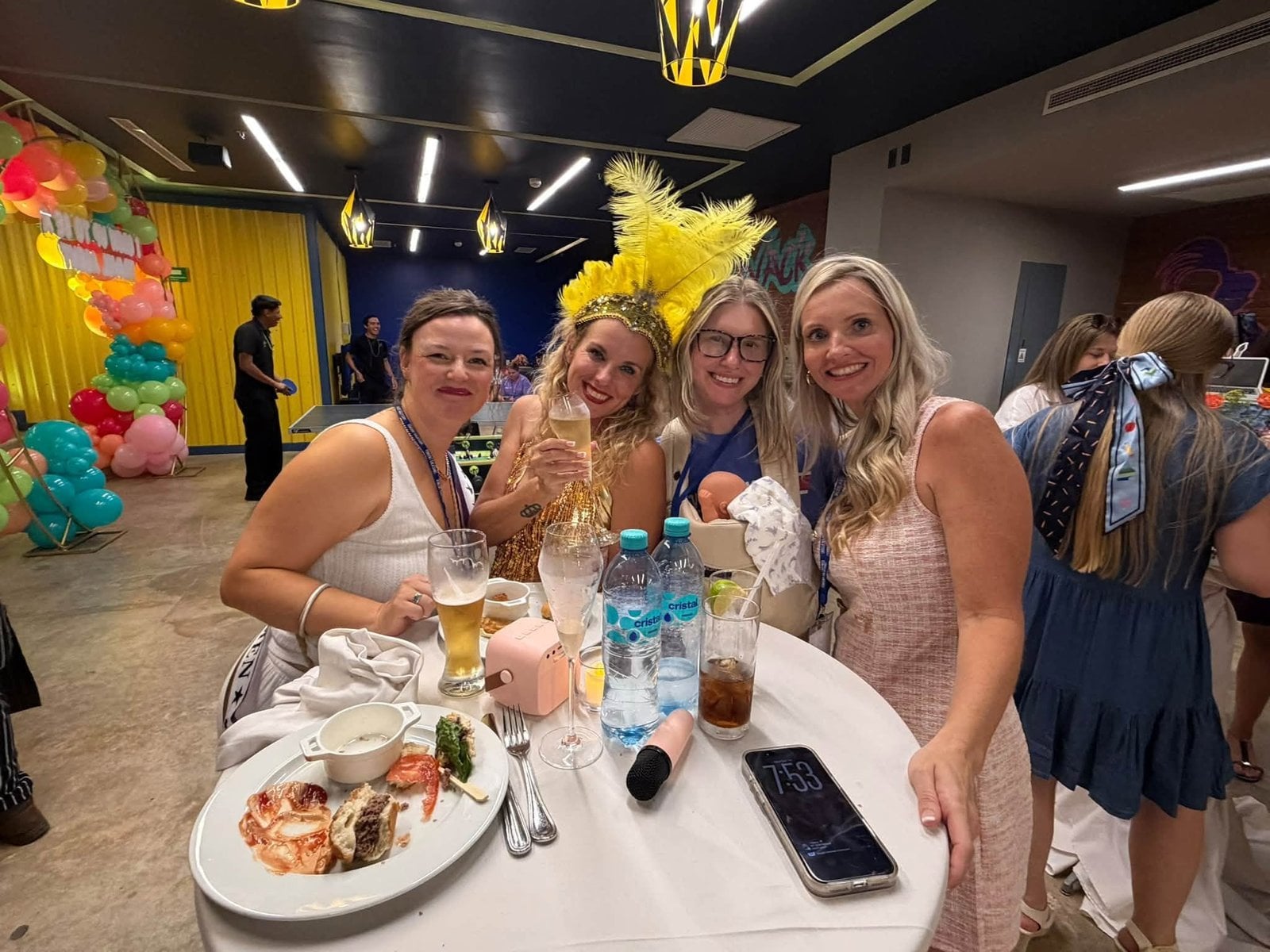 Travel advisors sharing laughs and tropical cocktails at the welcome celebration