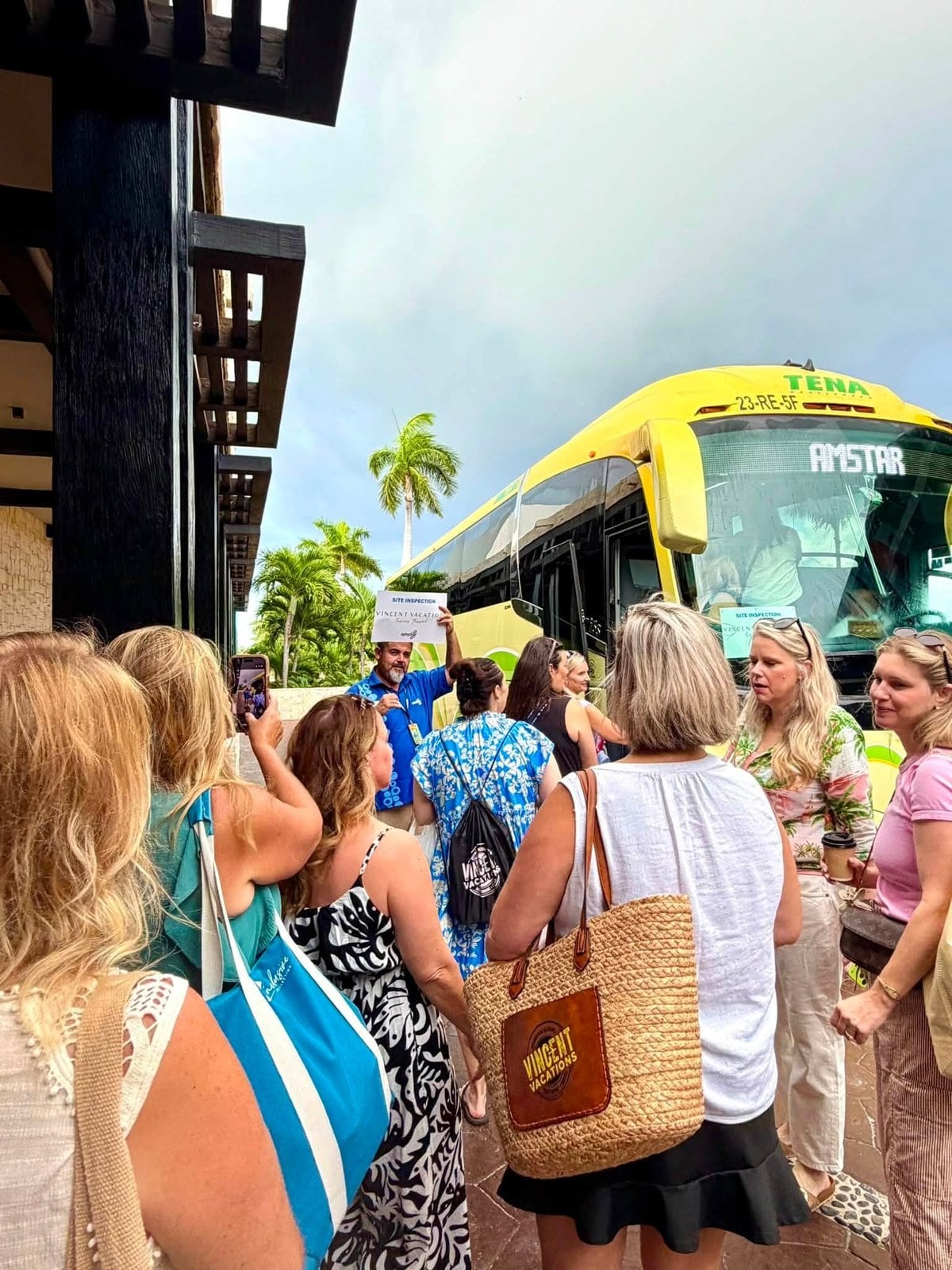 Vincent Vacations advisors boarding our private Amstar luxury motorcoach for resort inspections
