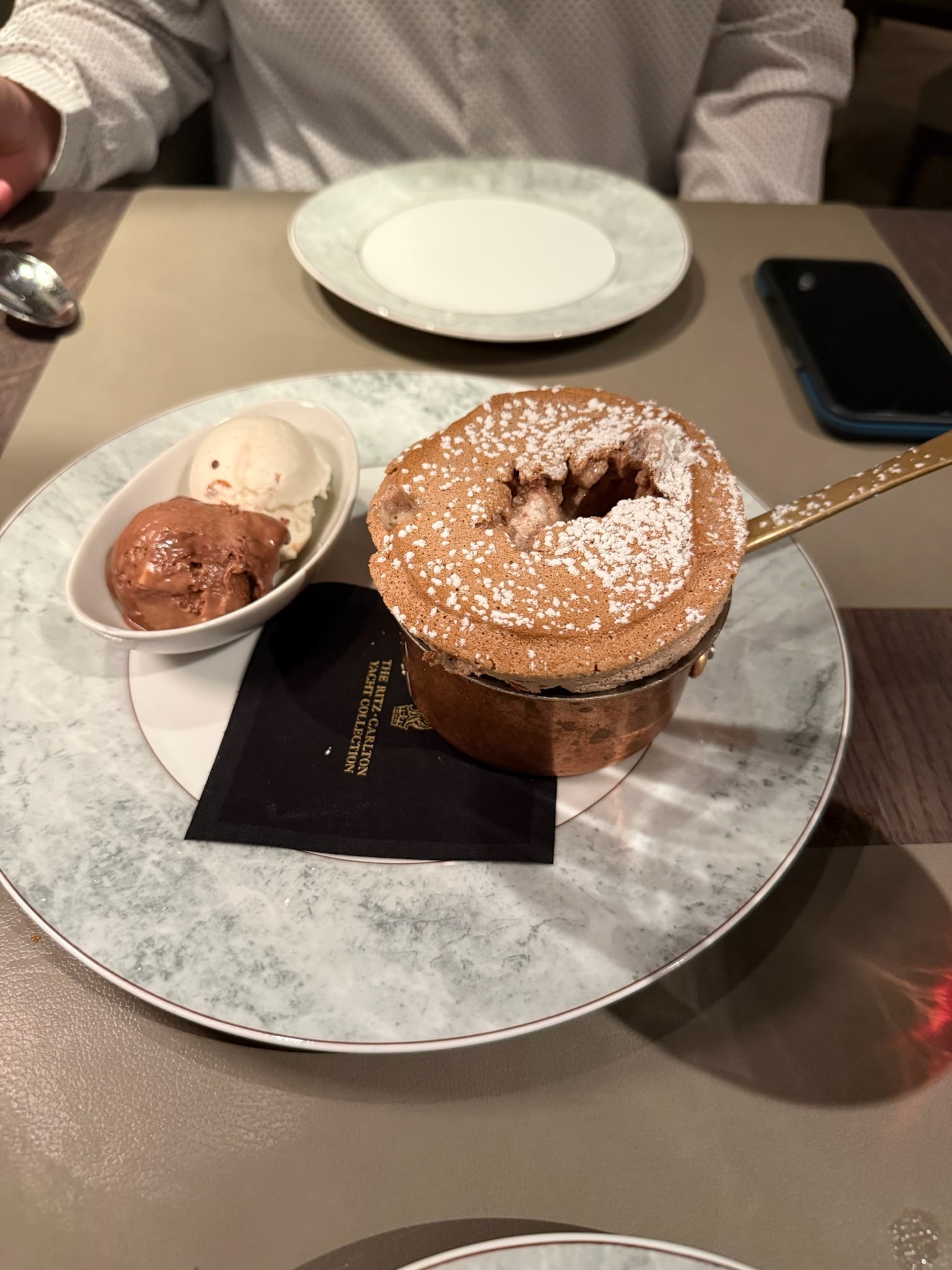 Freshly baked warm chocolate souffle with vanilla bean gelato on Ilma
