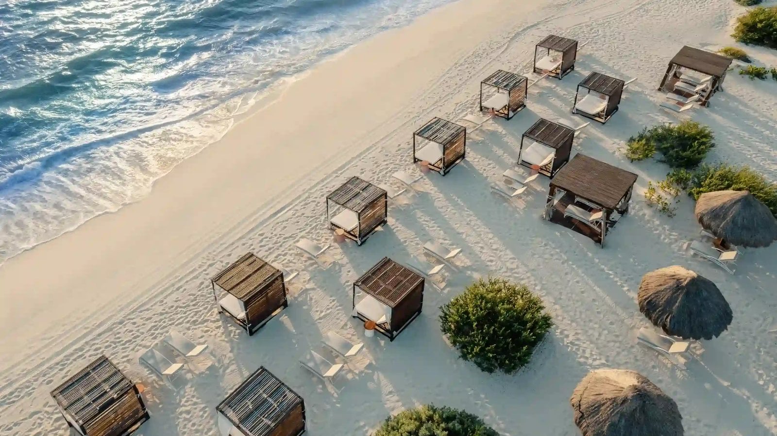 Atelier Playa Mujeres pristine Caribbean white sand beach with luxury daybeds