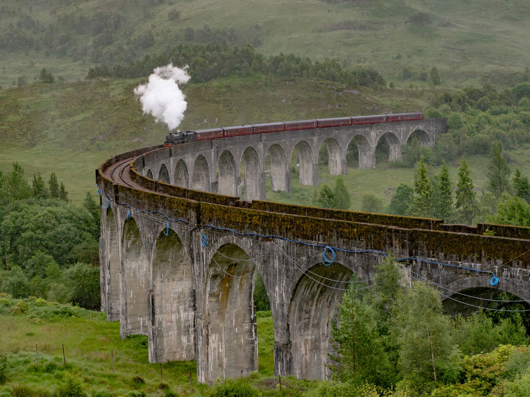 Belmond Royal Scotsman Luxury Train Traveling Through Scottish Highlands