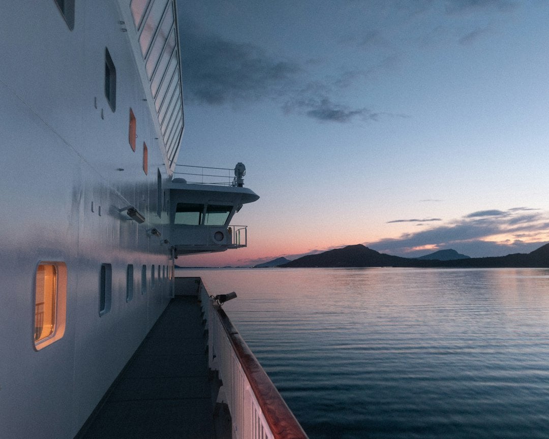 Distinctive Voyages hosted luxury cruise private veranda overlooking sunset ocean