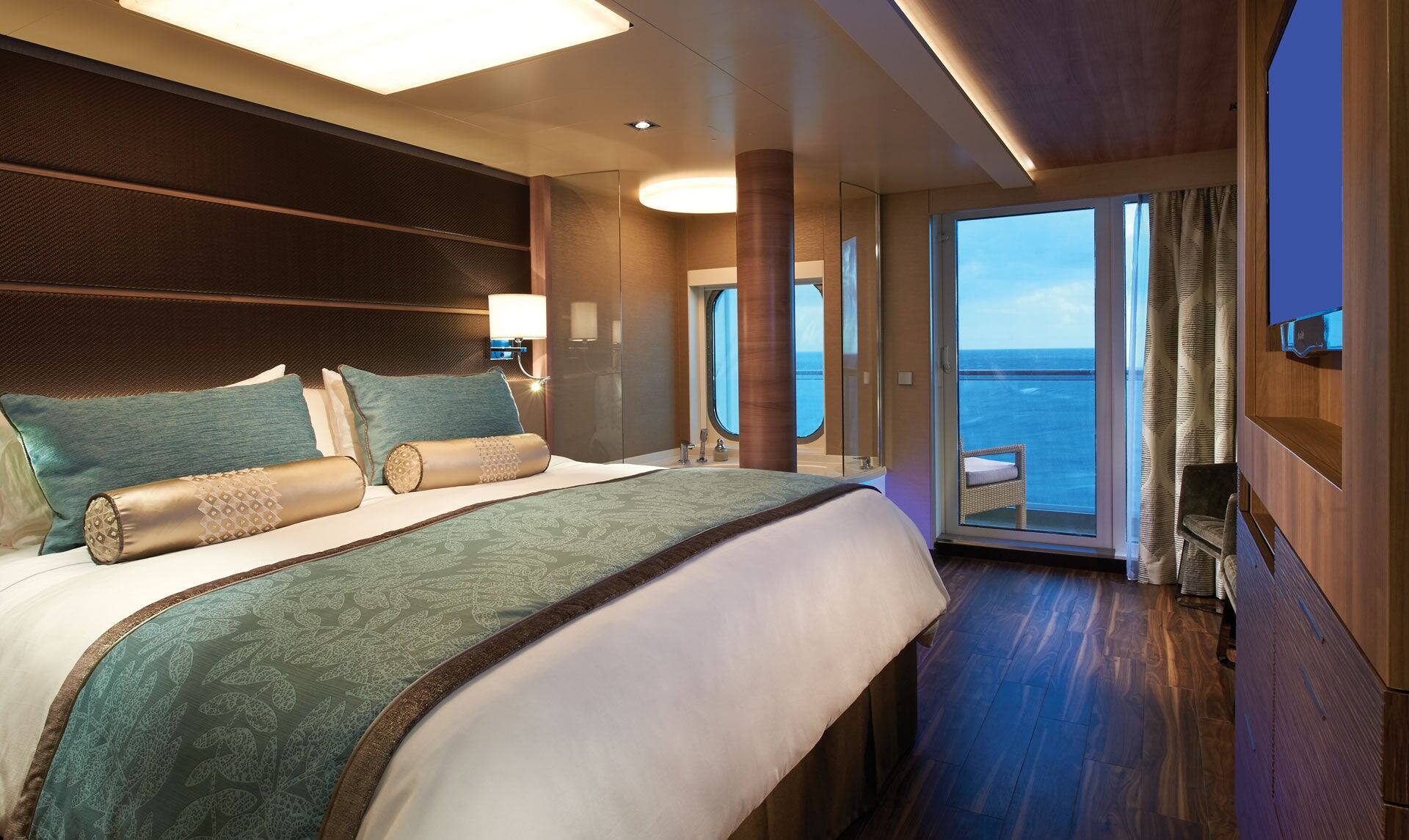 NCL The Haven Deluxe Owner’s Suite Master Bedroom and Balcony