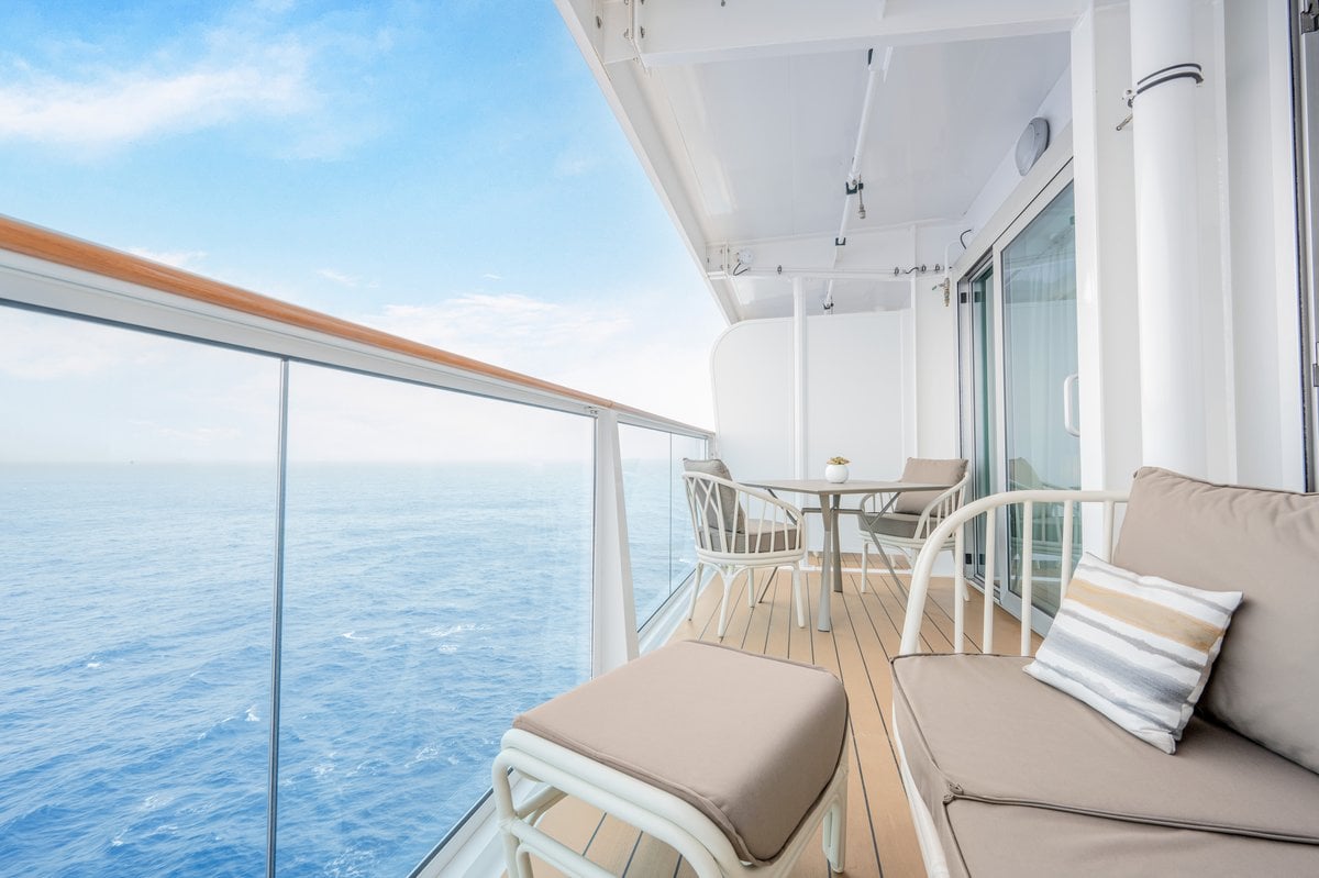 Penthouse Suite with Floor-to-Ceiling Windows and Balcony