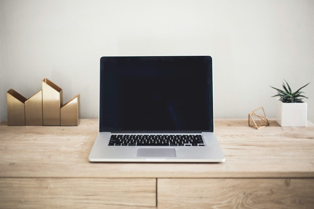 Executive legal compliance desk with Seller of Travel registration certificates, state compliance filings, and financial records