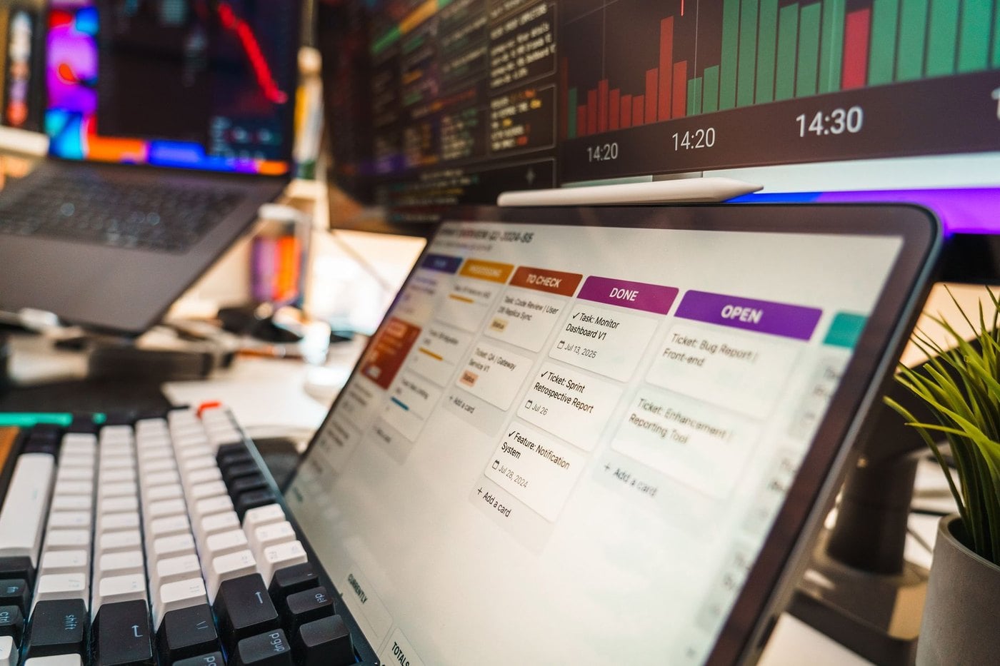 Travel agency multi monitor workstation displaying CRM pipeline automation and digital client workflows
