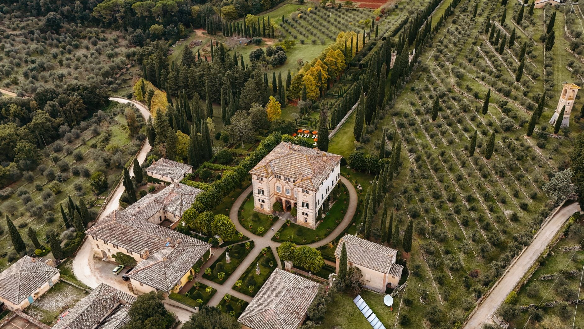 Rolling Hills of Tuscany with Cypress Trees and Historic Stone Villa