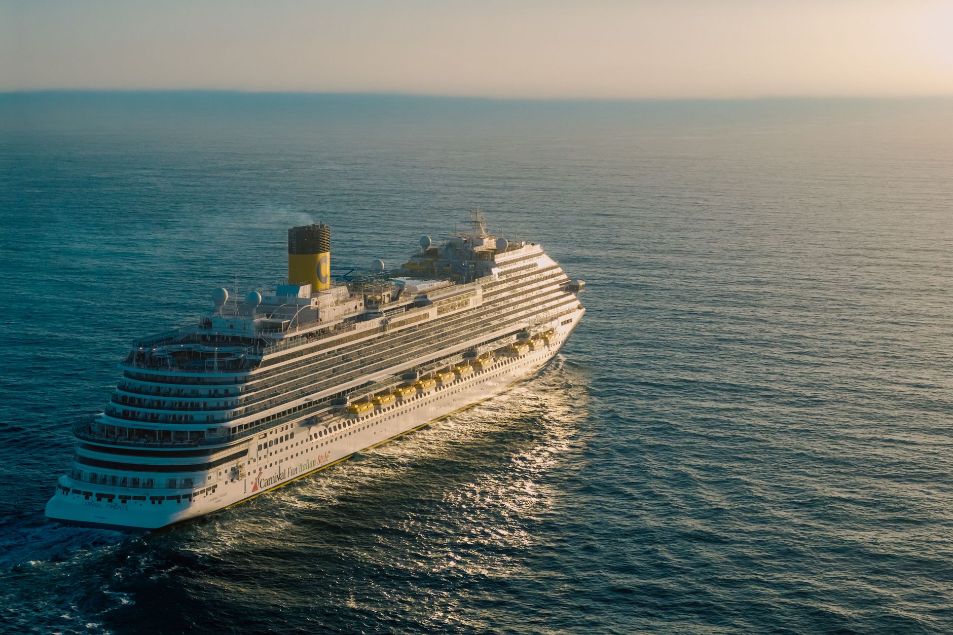 Luxury Cruise Ship Sailing in Mediterranean at Sunset