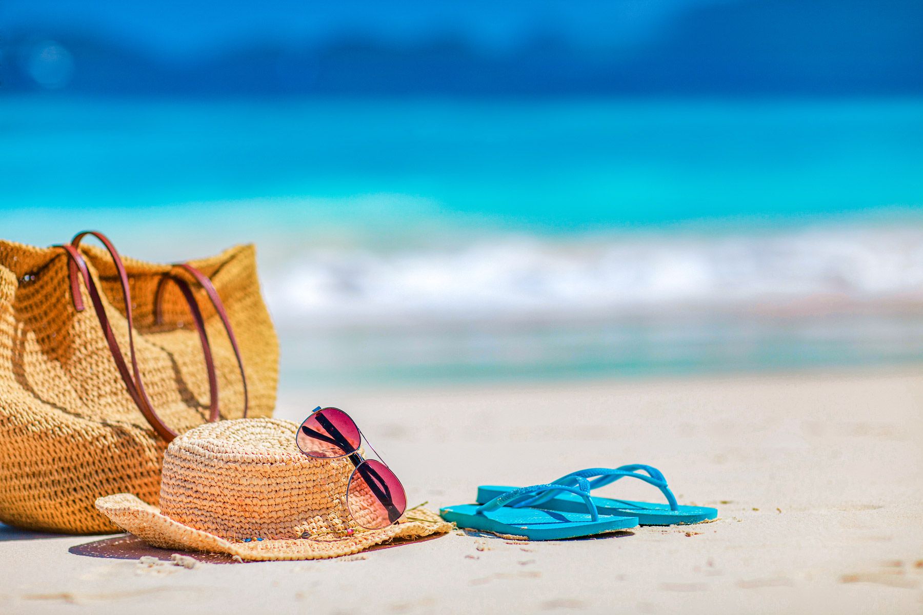 straw bag beach summer essentials