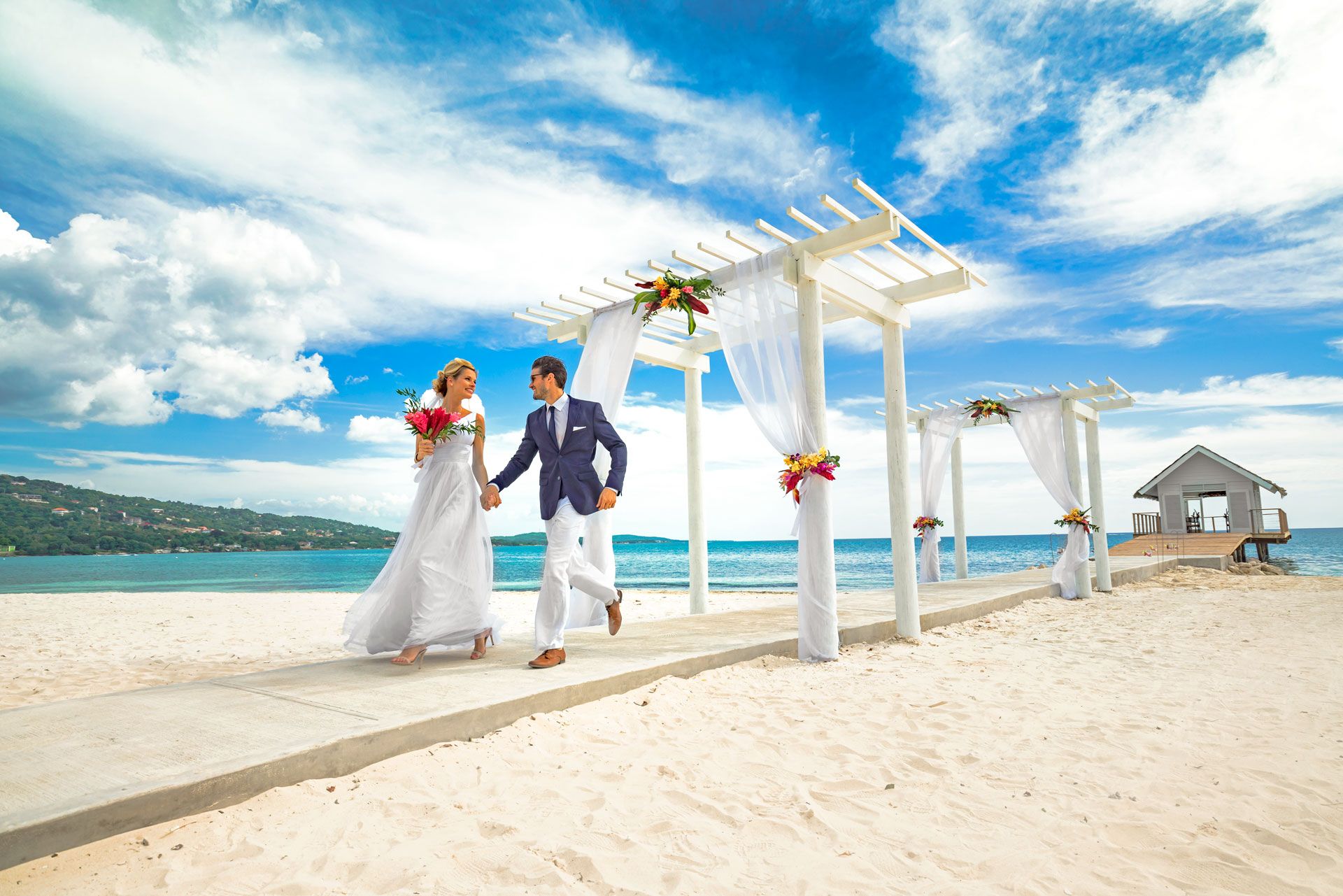 Married couple in overwater chapel