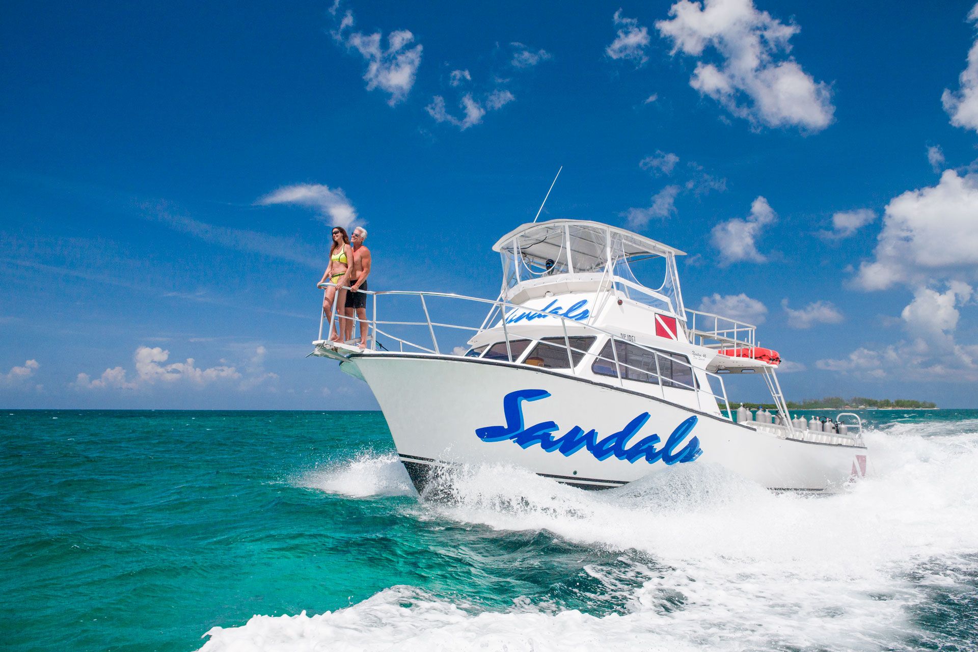 couple on scuba diving boat