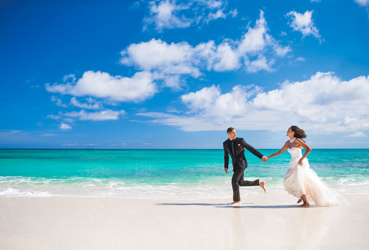 eloping couple on the beach