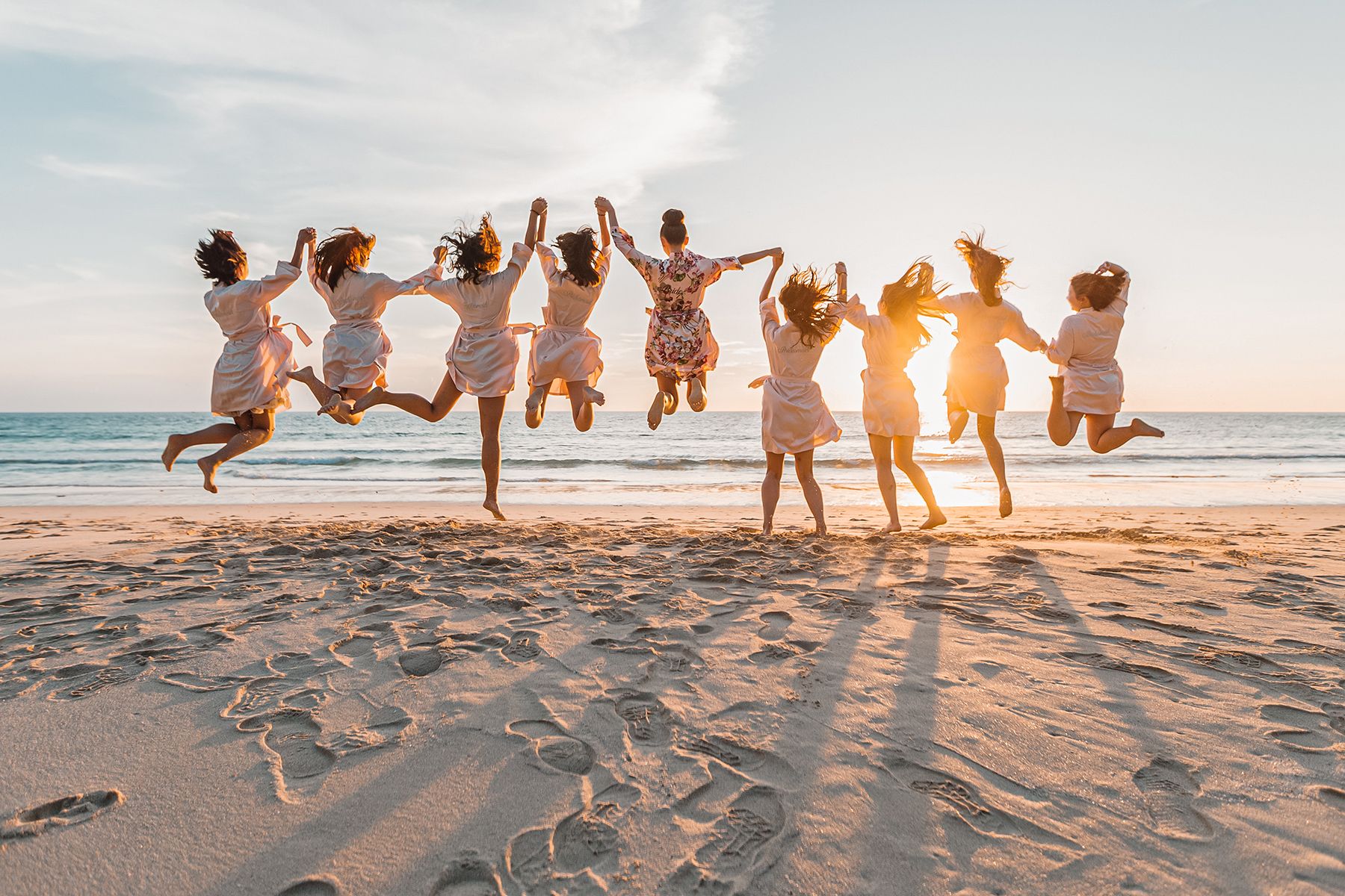 Bridesmaids Jumping Pose Beach