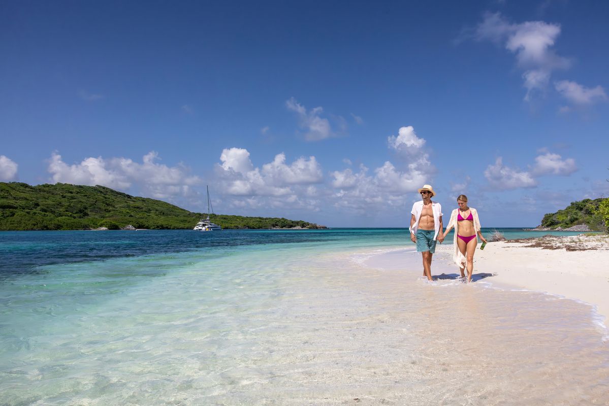 couple on a beach in st vincent