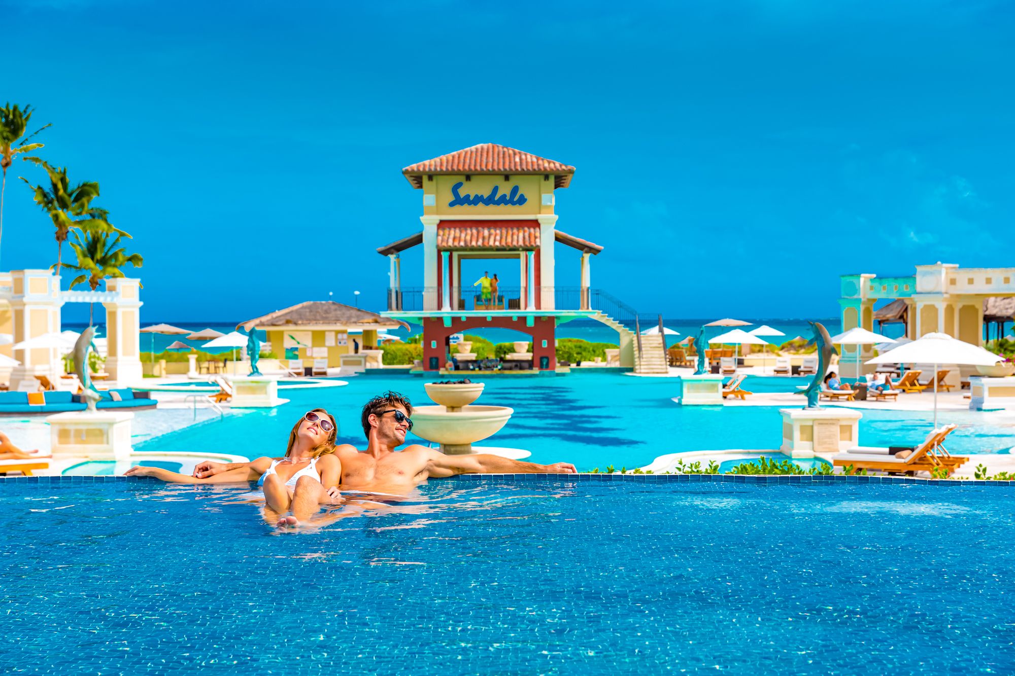 Sandals Emerald Bay Main Pool Couple