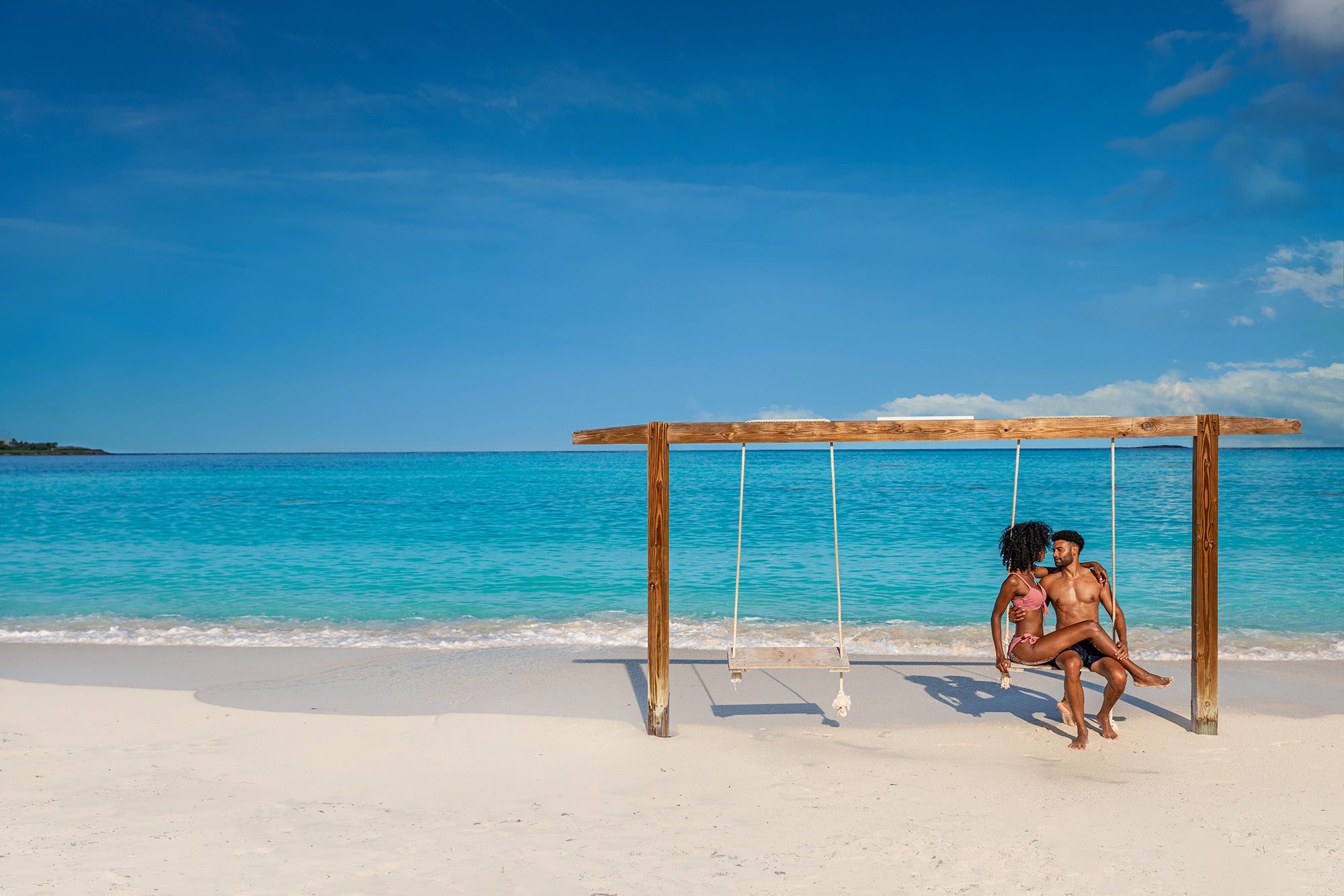 Sandals Emerald Bay The-Bahamas Couple Beach Swing