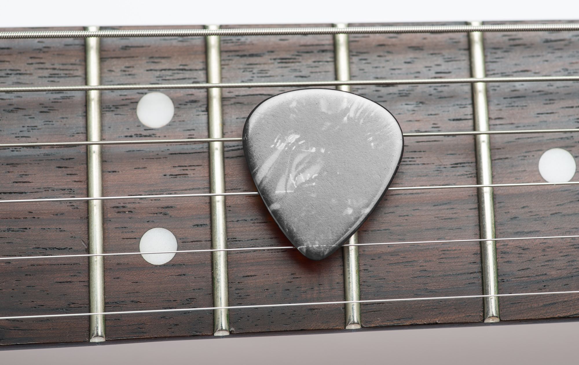 Silver Guitar Pick