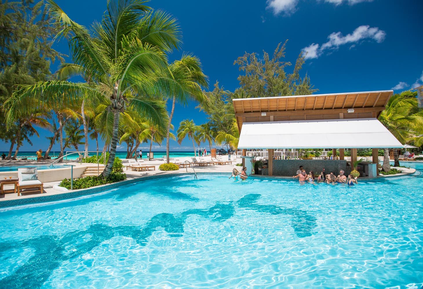 barbados swim-up bar and beach at sandals