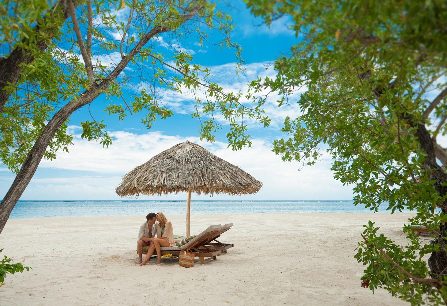 couple on beach at Sandals South Coast