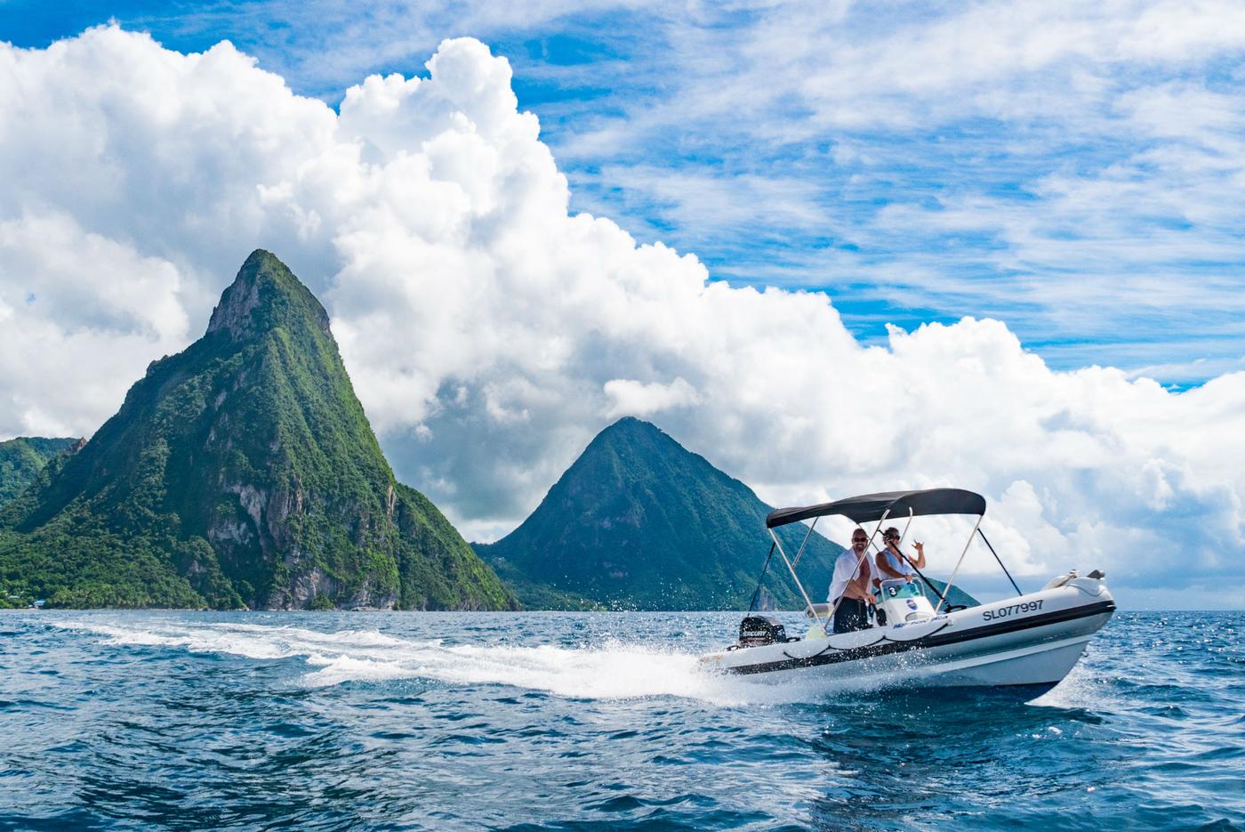 guests ridin speed boat alond st. lucia's coast