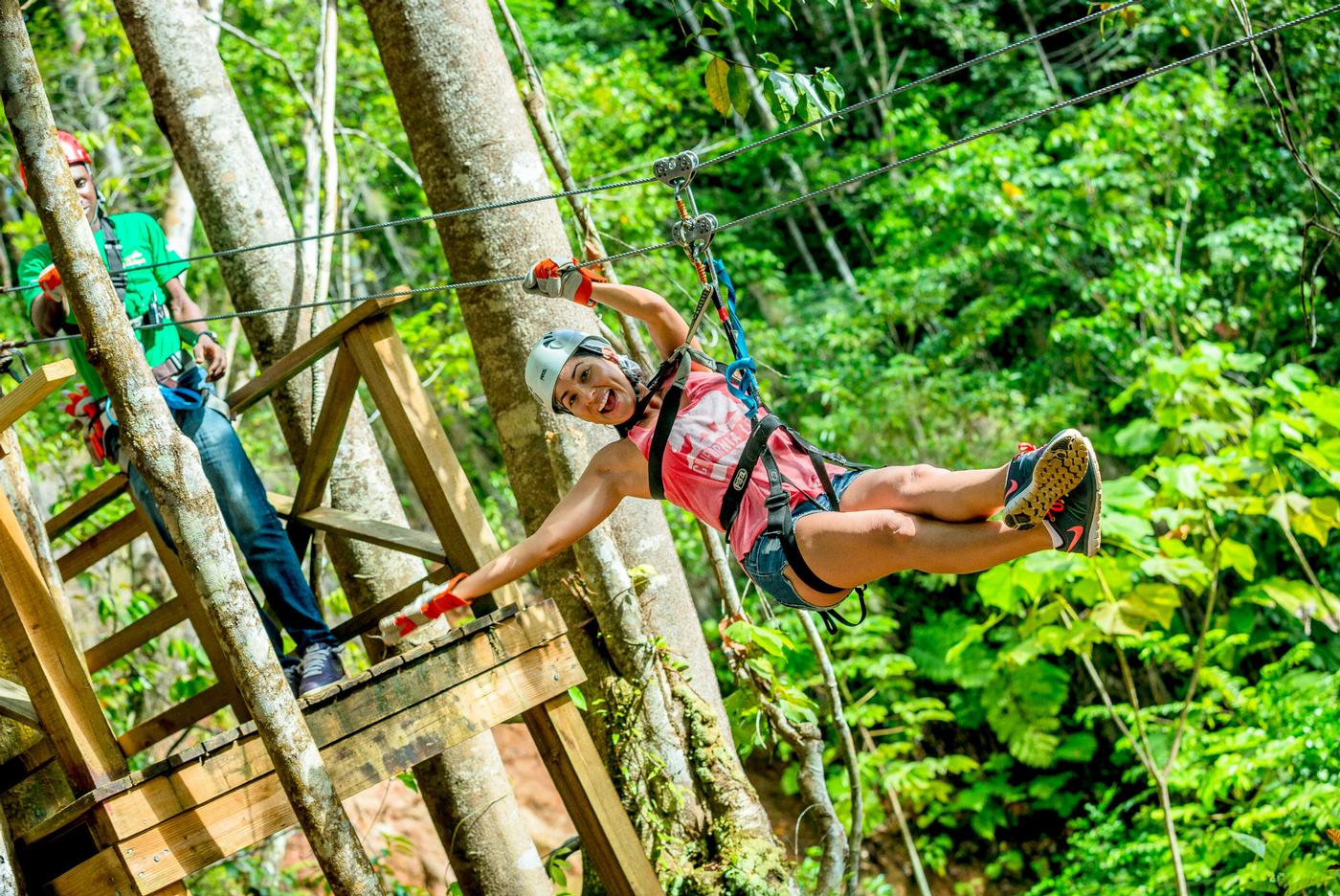 guest having fun on the treetop zip trip