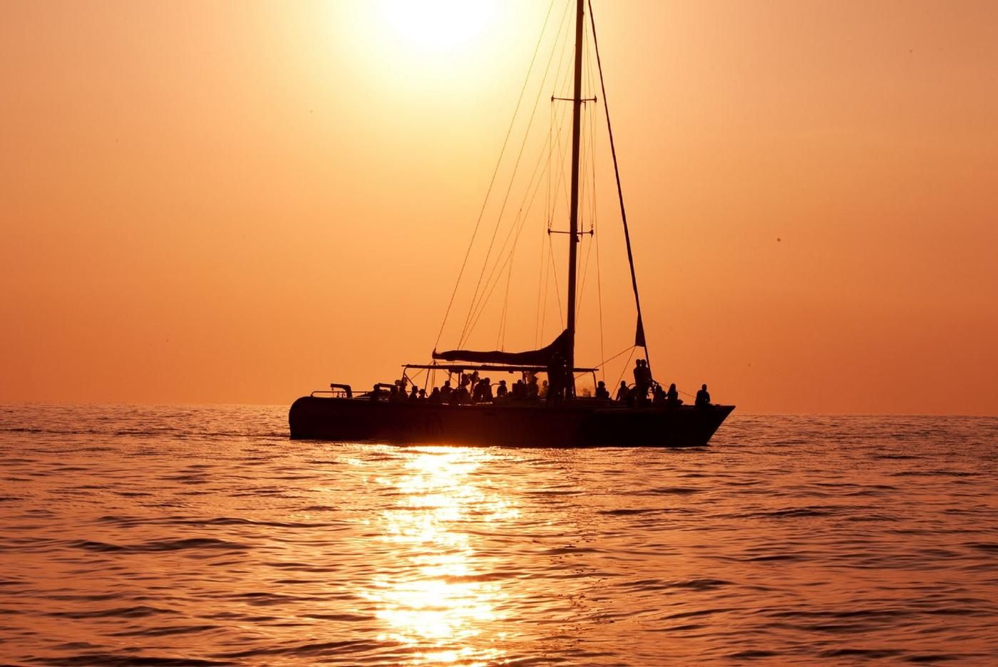 guests enjoying the view on board of the sunset cruise