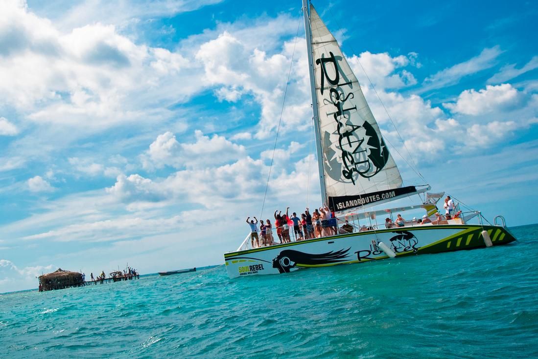 island routes catamaran cruise with guests at floyd's pelican bar
