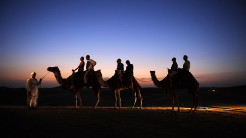 4x4 Desert Safari with Dune Bashing, Sandboarding & Camel Ride
