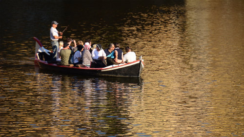 River Cruise by Traditional Florentine Barchetto Boat