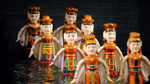 Night Walking Tour with Water Puppet Show by Threeland Travel