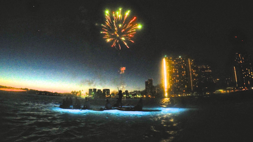 Stand-Up Paddleboarding with Fireworks